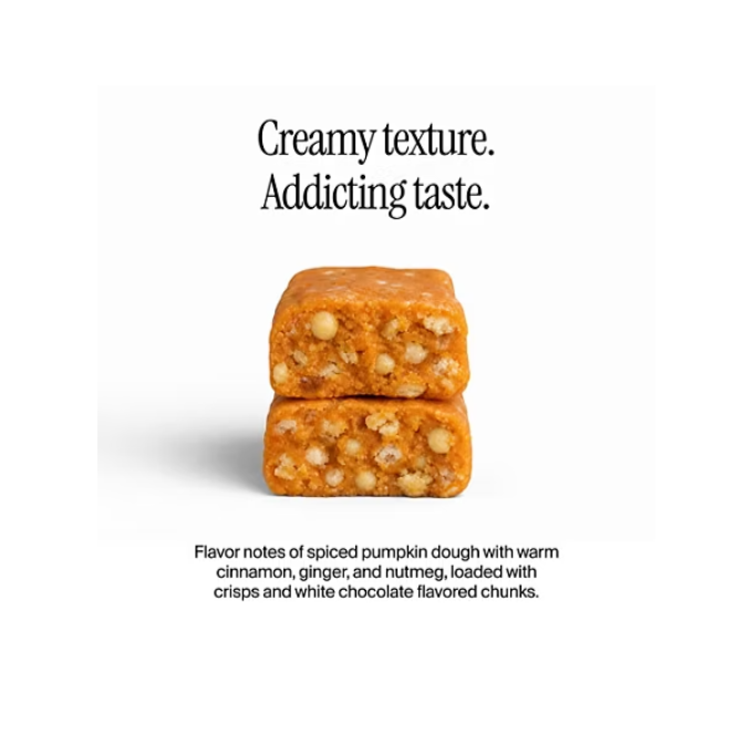 David Pumpkin Spice protein bar cut open — spiced dough with crisps and white chocolate flavored chunks