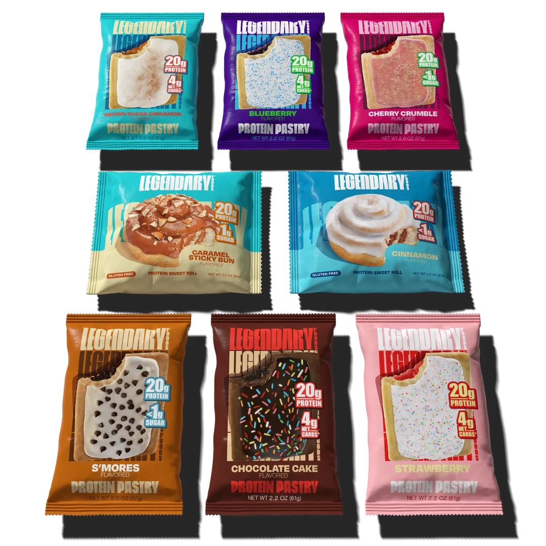 Lineup of Legendary protein snacks including sweet rolls, pastries and cake in colorful packages