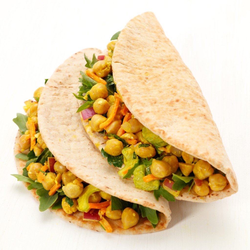 Joseph's Bakery Flax, Oat Bran & Whole Wheat Pita Bread pockets stuffed with chickpea salad and greens, serving shot