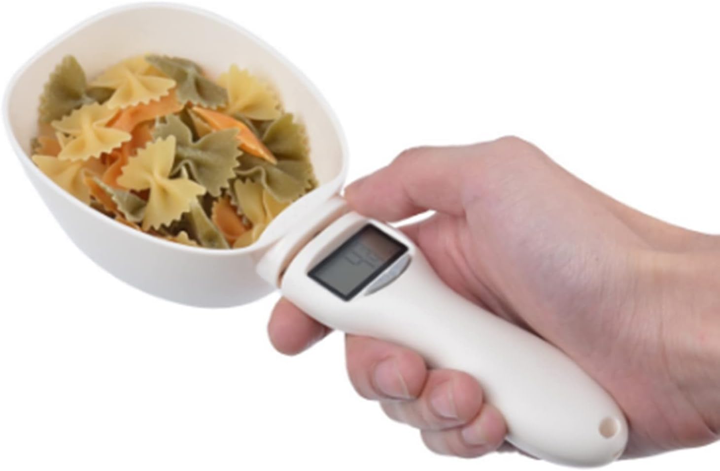 Detachable spoon lifted off the digital scale base for quick and thorough cleaning after use