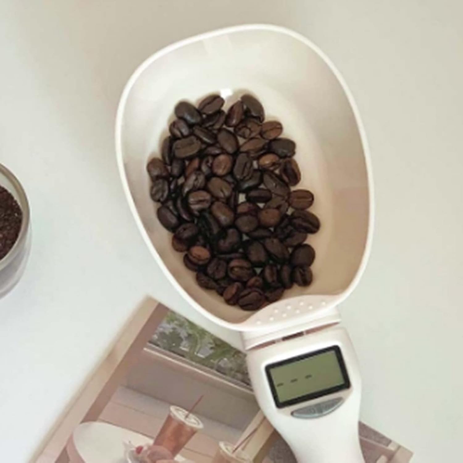 Measuring spoon scale weighing spices and dry ingredients for accurate cooking and baking portions