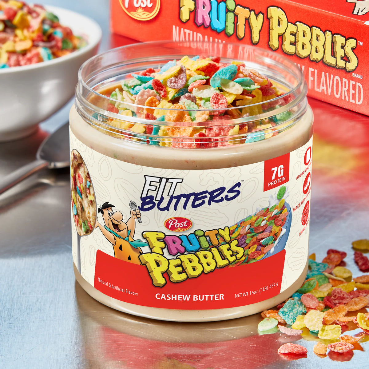 Fit Butter Fruity PEBBLES high-protein cashew butter jar, side view of the label