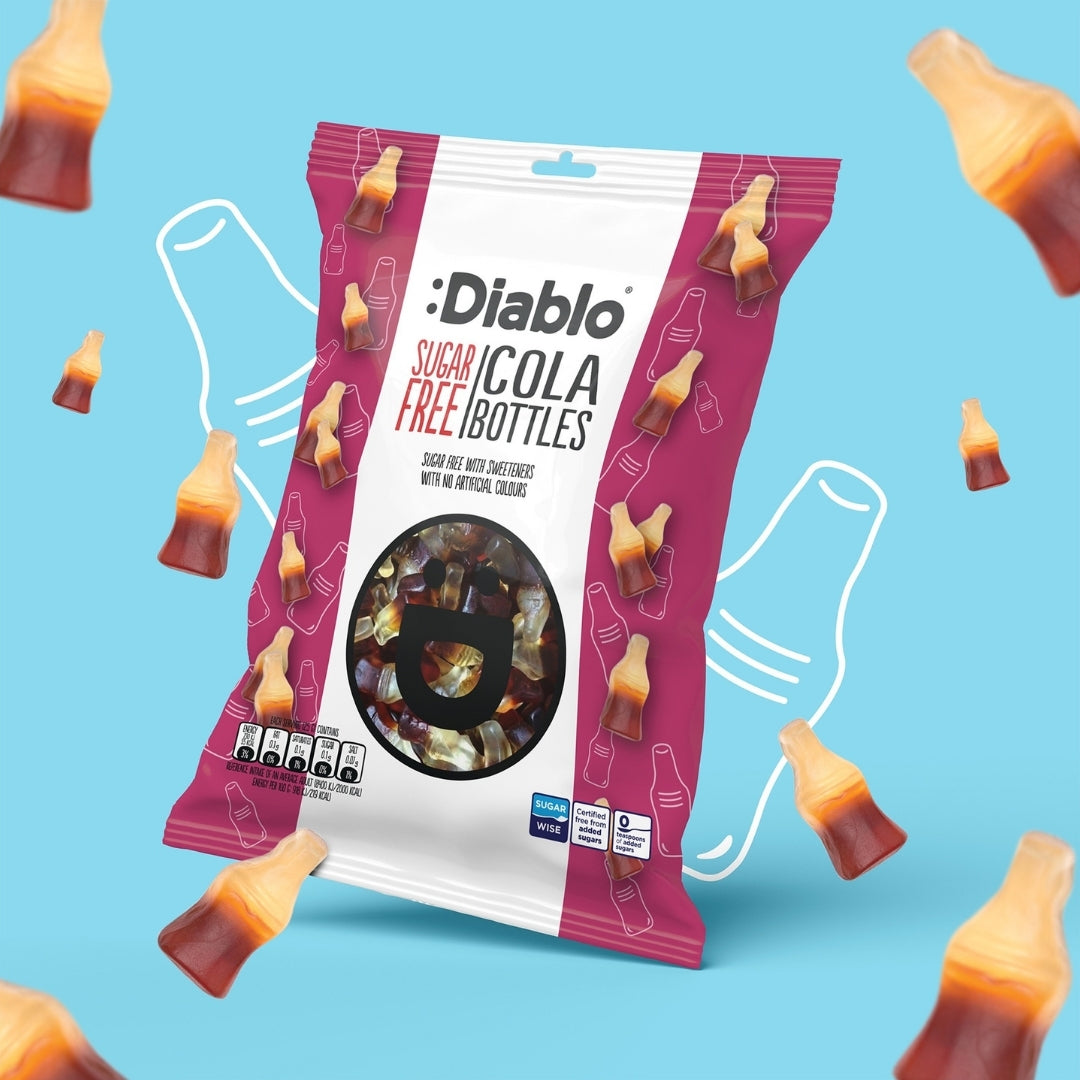 Diablo Sugar Free Cola Bottles 75g bag with scattered cola bottle gummy sweets on a blue background