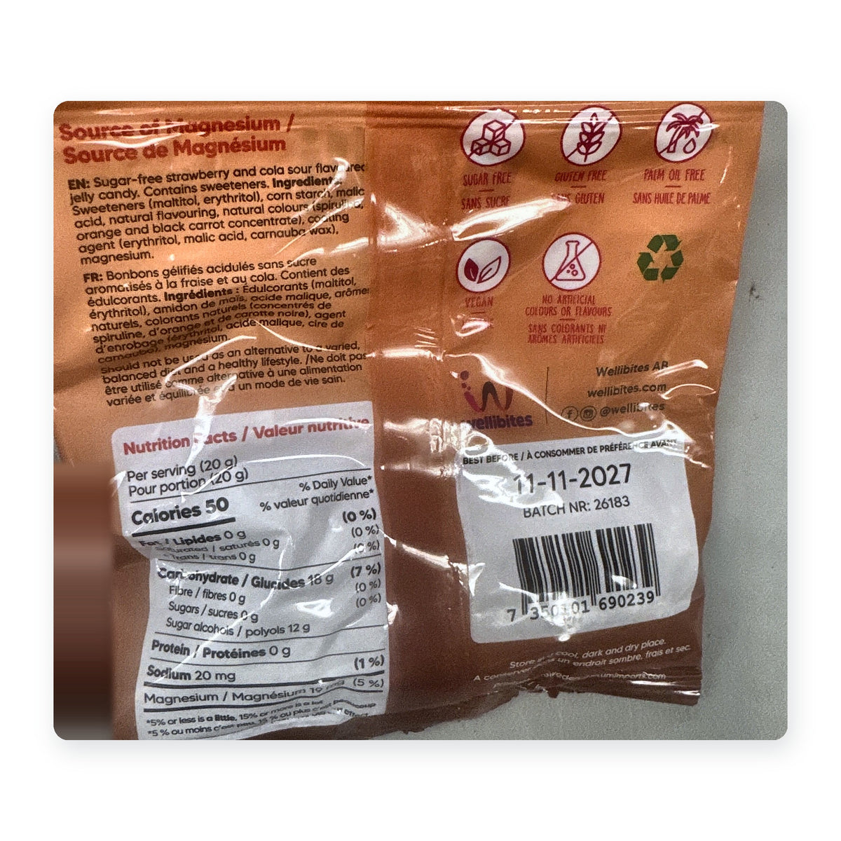 Back of the Wellibites Strawberry Cola 70 g bag showing nutrition facts, ingredients and sugar-free, gluten-free, vegan icons